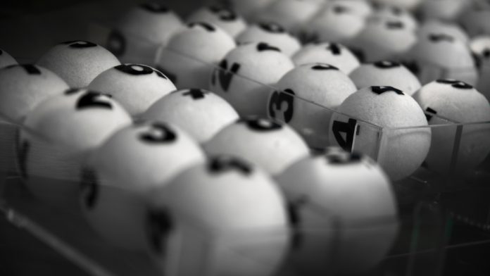 Lottery balls in a tray