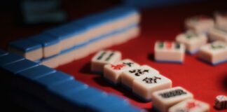 a set of mahjong tiles on a game board