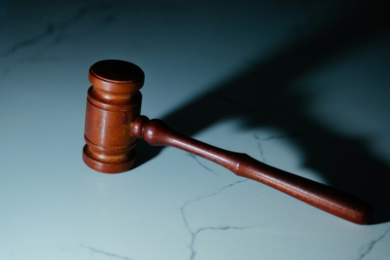 a gavel hitting a marble surface